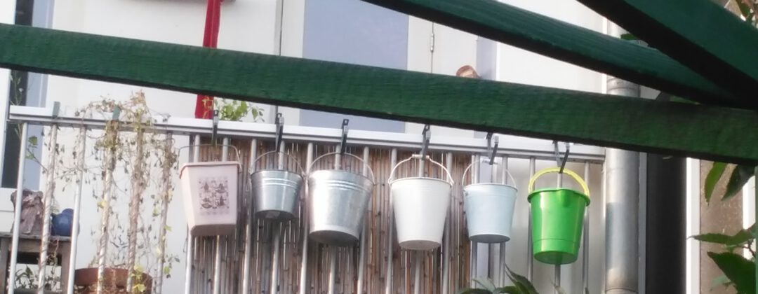 Emmers op balkon als regenton Amsterdam Weerproof